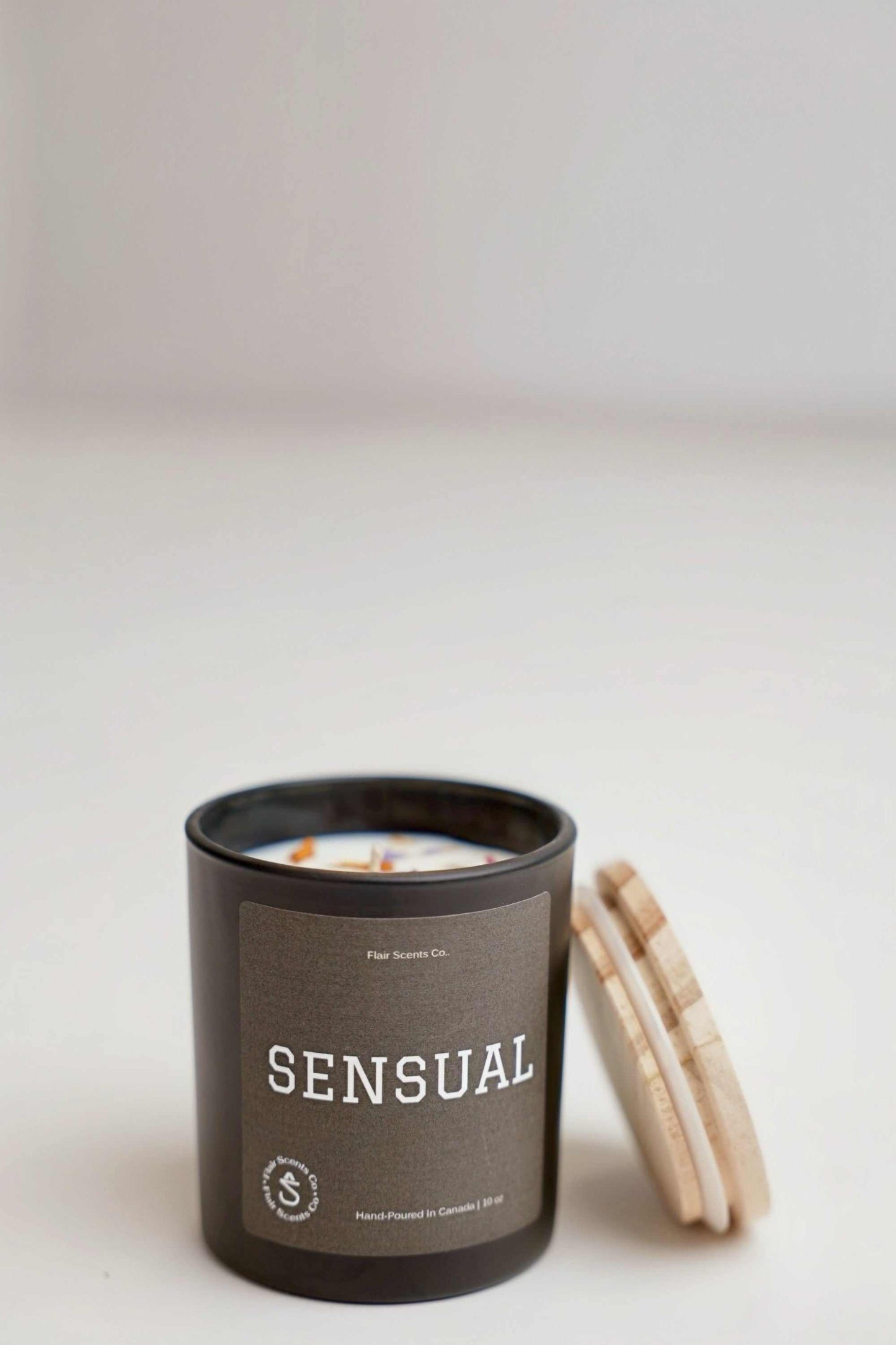 Sensual soy wax candle made with essential oils, designed to create a warm, relaxing atmosphere at home