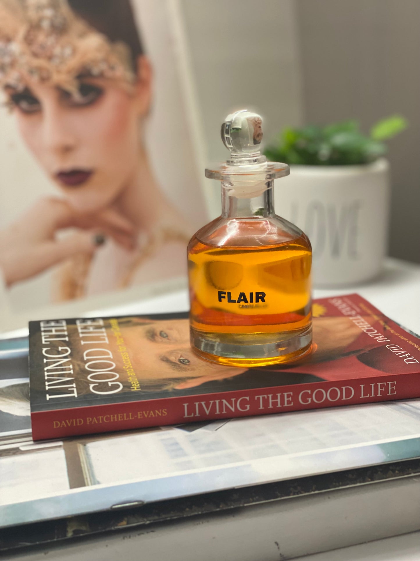 Reed diffuser bottle with natural reeds used to scent indoor spaces