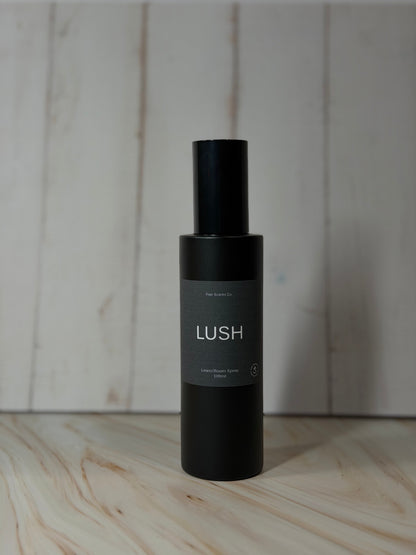 Black 100ml Lush room spray bottle with enchanting scent of patchouli, lavender, and rose petals