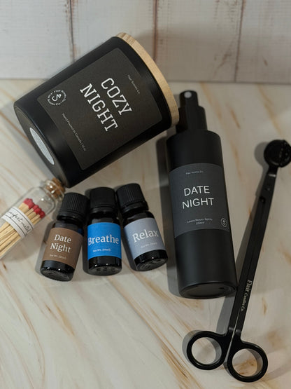 Evening Reset Bundle self-care set with Cozy Night candle, essential oils, room spray, wick trimmer, and matches for calming nighttime routine