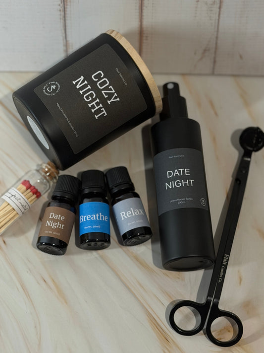 Evening Reset Bundle self-care set with Cozy Night candle, essential oils, room spray, wick trimmer, and matches for calming nighttime routine