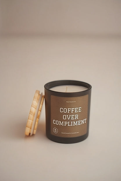 "Coffee over compliments soy candle with cappuccino scent and wooden lid"

