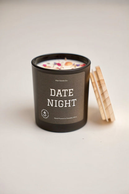 Date Night luxury soy candle with raspberry jam jasmine and rose petal scent in black jar with wooden lid