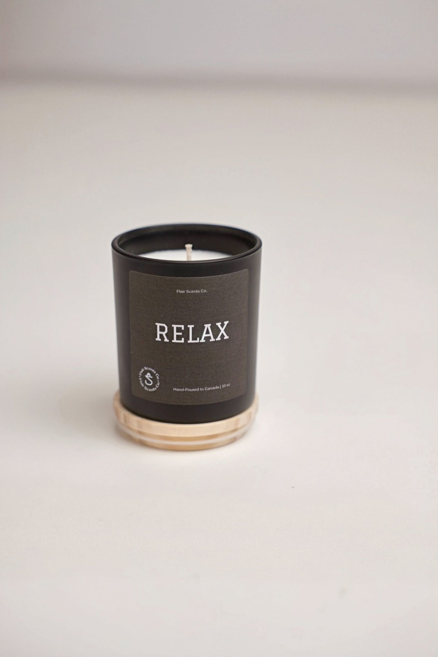 Relax candle with calming eucalyptus, lavender, chamomile scent in organic soy wax jar