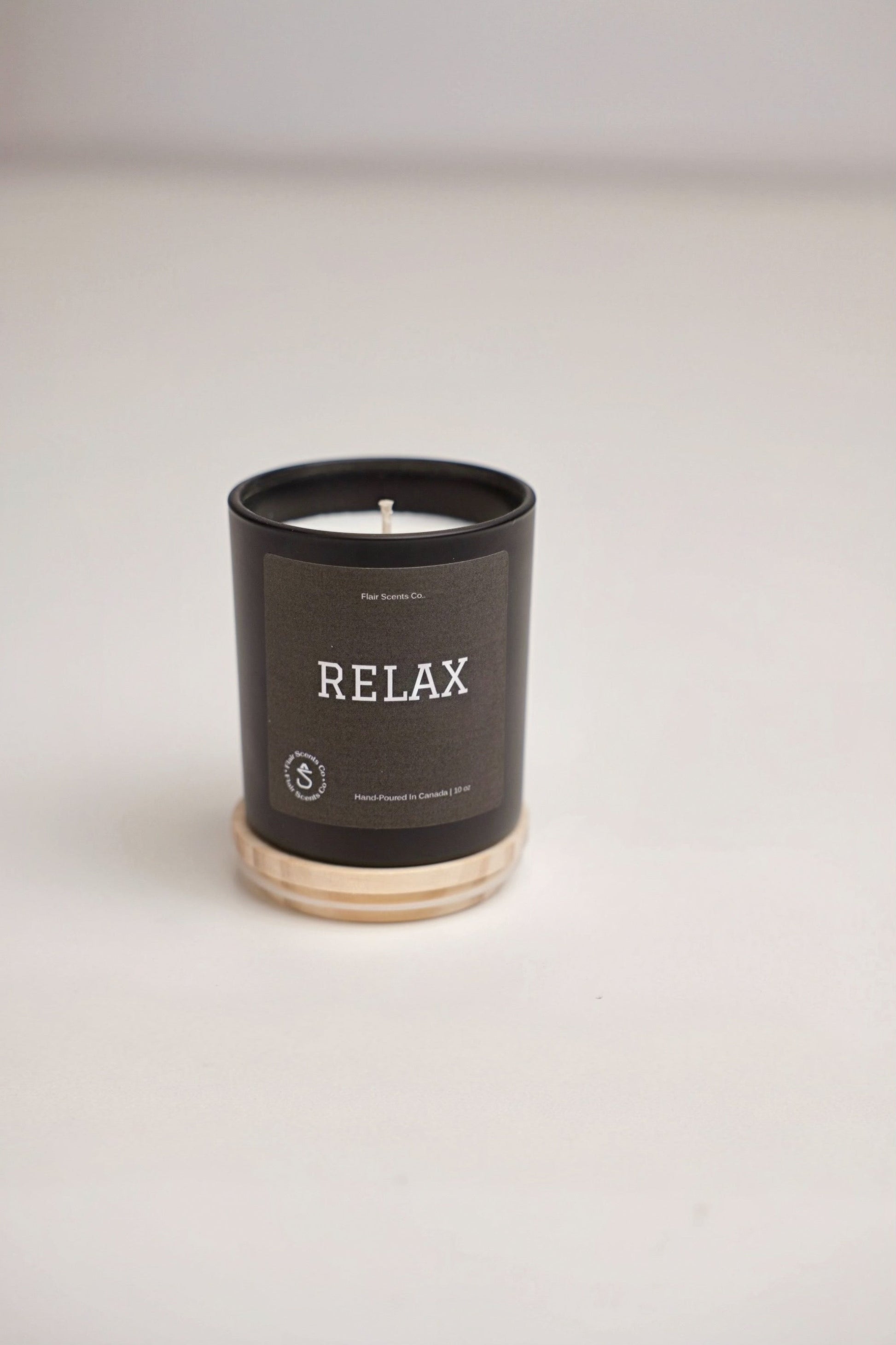 Relax candle with calming eucalyptus, lavender, chamomile scent in organic soy wax jar