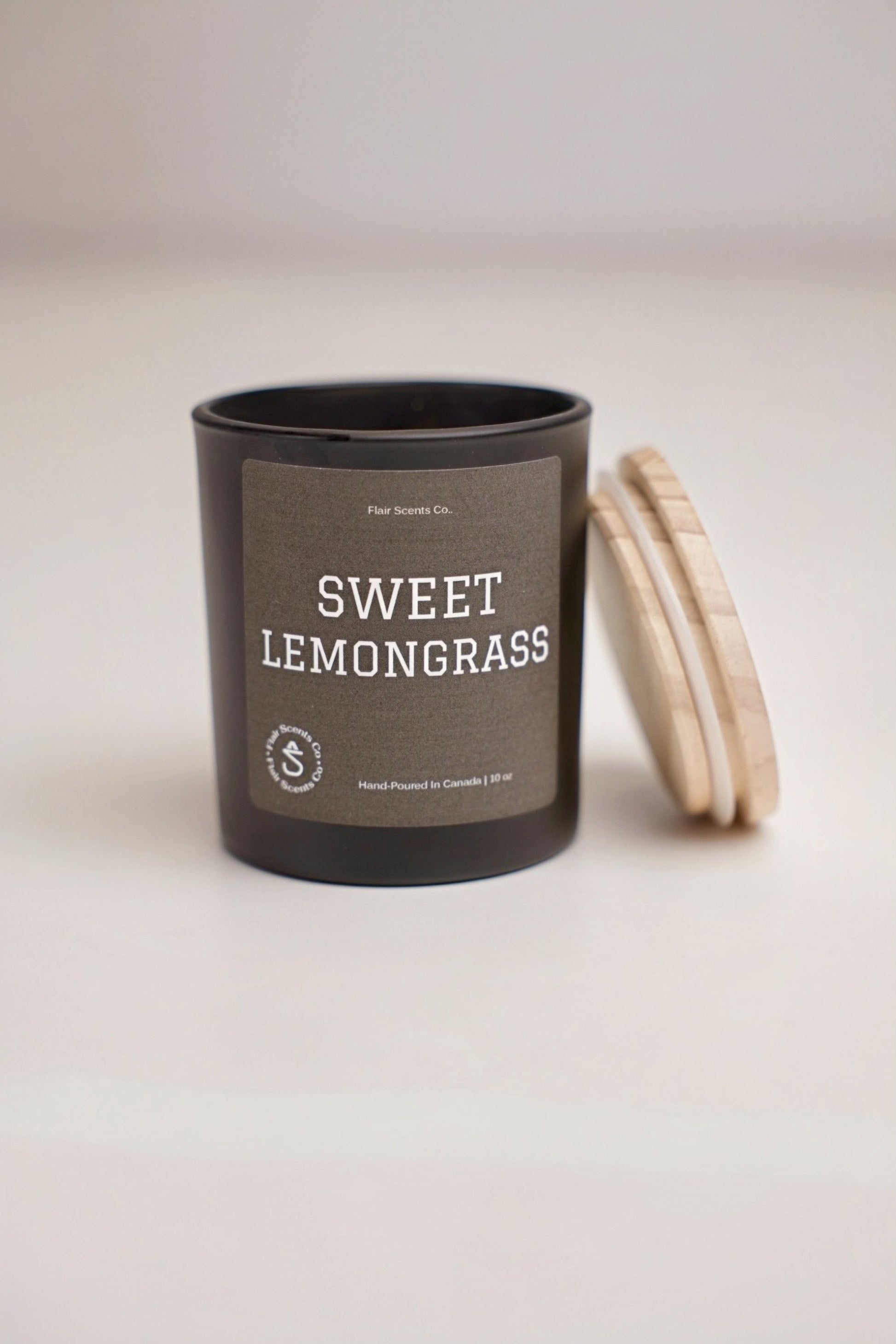 Sweet Lemongrass organic soy wax candle with lemongrass, vanilla, jasmine, and cider scent